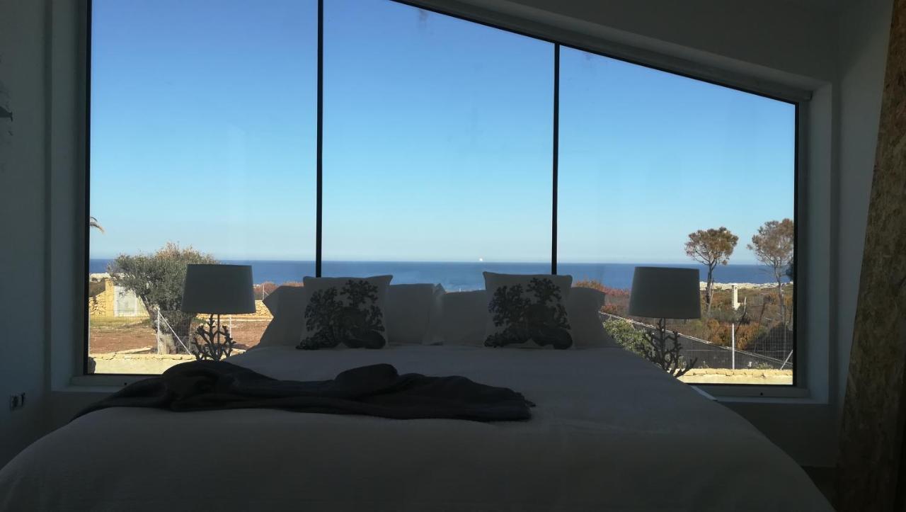 Zimmer mit Queensize-Bett und Meerblick